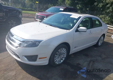 2012 Ford Fusion Hybrid from USA, damaged, VIN 3FADP0L38CR347783